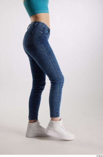 Rada  1 blue jeans casual dressed flexing leg side…